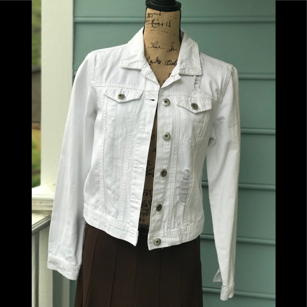White distressed jean jacket.